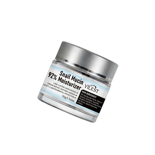 Jar of snail mucin moisturizer with YILEST branding on a beige background