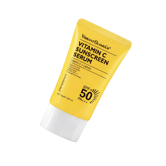 Yellow tube of Vitamin C Sunscreen Serum with SPF 50 on a white background